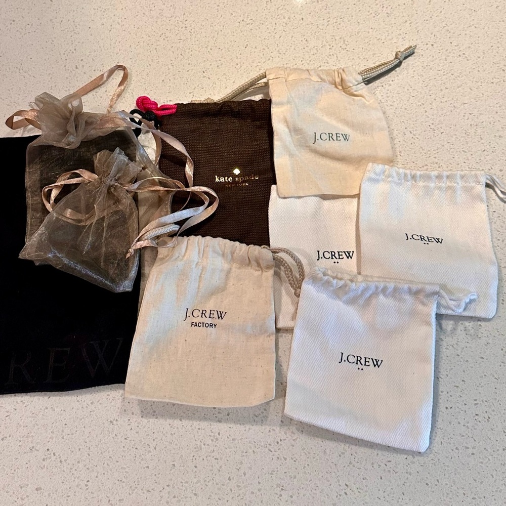 Assorted jewelry dust bags - 9 total